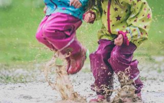 Rainy day activities for kids jumping in puddles